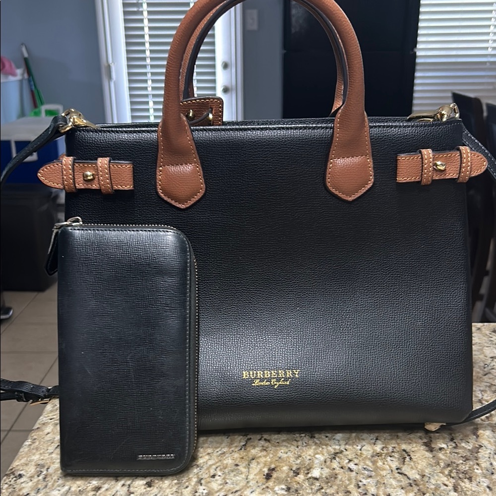 Burberry Black and Brown Leather purse with plaid on sides and Burberry wallet